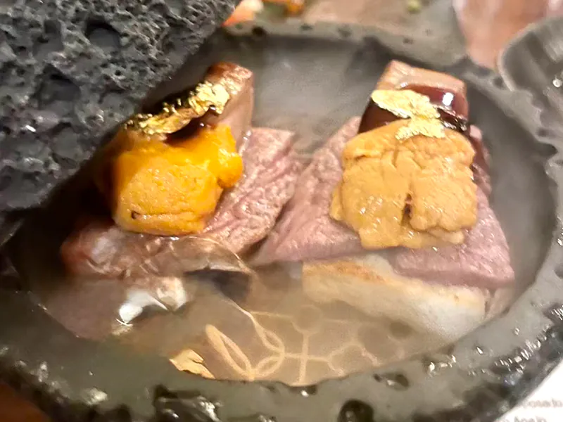 Seared A5 wagyu topped with uni & edible gold leaf at Koi Sushi, a Japanese Restaurant in Gaithersburg